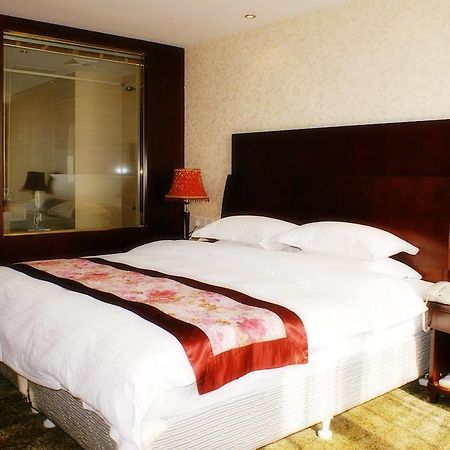 Weigela Park Hotel Далянь Номер фото